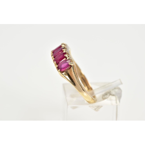 66 - A 9CT GOLD RUBY RING, designed with five oval cut claw set rubies, to a plain polished band, hallmar... 