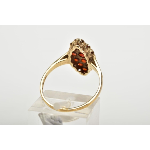 8 - A 9CT GOLD GARNET RING, of lozenge set with fifteen circular cut garnets, to the plain polished band... 