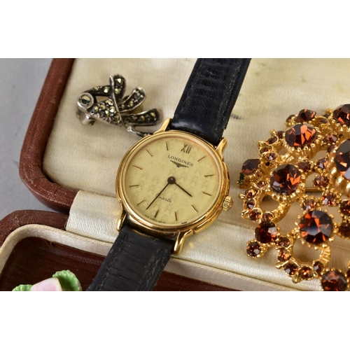 83 - A SELECTION OF ITEMS, to include a Longines lady's wristwatch cream dogtooth patter dial, roman nume... 