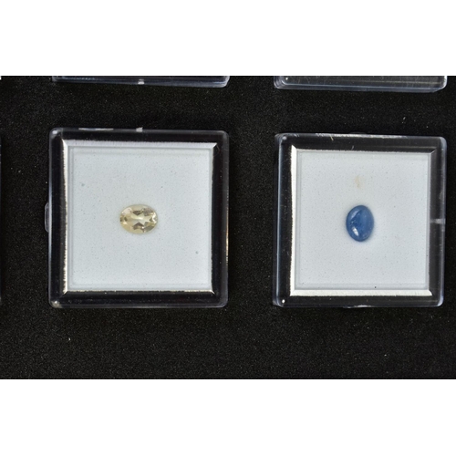 84 - A SMALL SELECTION OF GEMSTONES, to include a box of three oval cut stones assessed as amethyst, citr... 