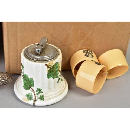 87 - A BOX OF VARIOUS ITEMS, to include seven embossed white metal napkin holders, a large embossed white... 