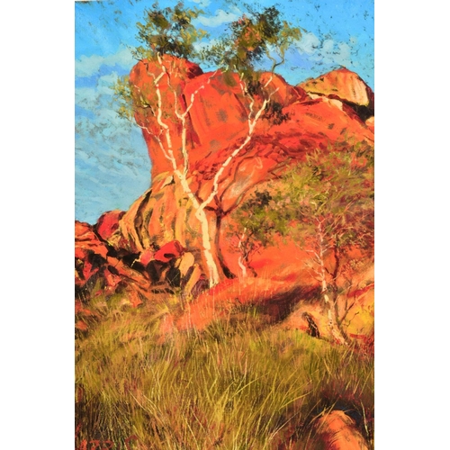 306 - ROLF HARRIS (AUSTRALIAN 1930) 'SUN ON DEVIL'S MARBLES', A limited edition print of the Australian ou... 