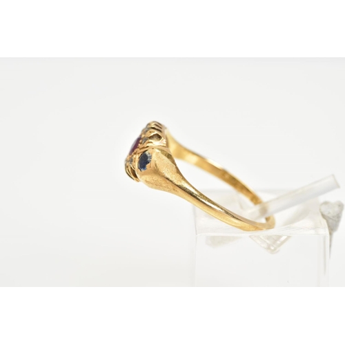 32 - AN EARLY 20TH CENTURY 18CT GOLD GEM SET RING, designed with a circular cut ruby within a single cut ... 