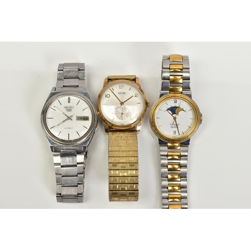 39 - THREE GENTLEMEN'S WRISTWATCHES, to include one with a silver dial, Arabic and baton markers, a secon... 