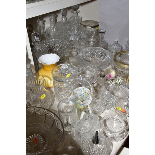 352 - A MISCELLANEOUS COLLECTION OF GLASSWARE, mostly cut glass including bowls, decanters, biscuit barrel... 