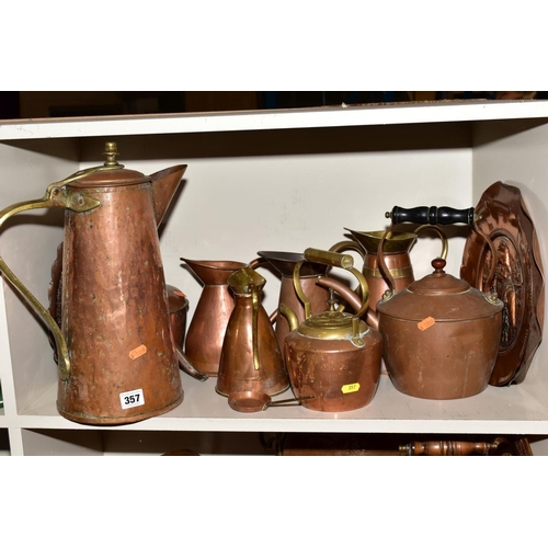 357 - A COLLECTION OF COPPER WARE, including moulds, fish moulds, fruit moulds, colander, kettles, hot wat... 