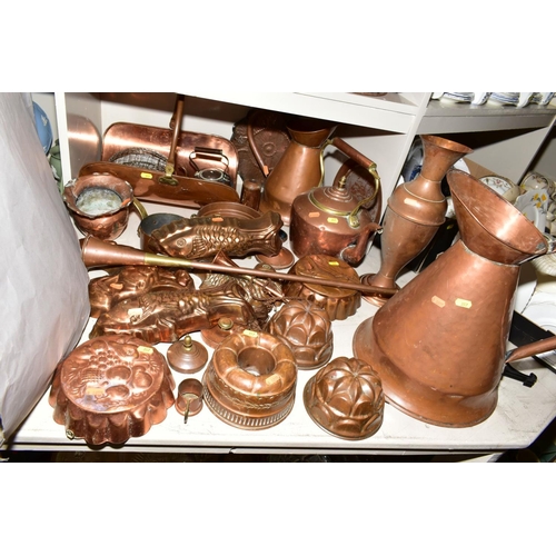 357 - A COLLECTION OF COPPER WARE, including moulds, fish moulds, fruit moulds, colander, kettles, hot wat... 