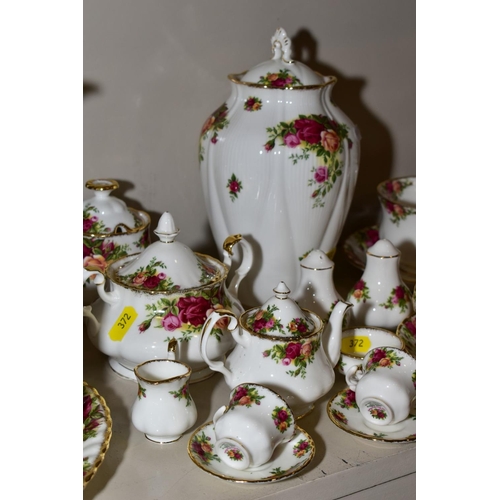 372 - A QUANTITY OF ROYAL ALBERT OLD COUNTRY ROSES, including minature tea for two set, a sauce boat on st... 