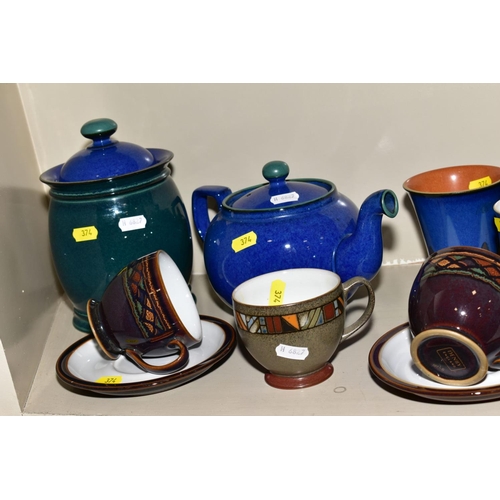 374 - A COLLECTION OF DENBY POTTERY MUGS, TEA POTS, etc, various patterns and glazes, including a coffee p... 