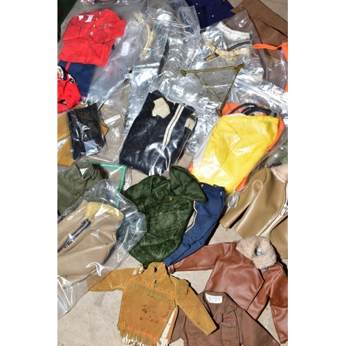 379 - A QUANTITY OF ASSORTED ACTION MAN CLOTHING AND ACCESSORIES, to include Astronaut and Guardsman cloth... 