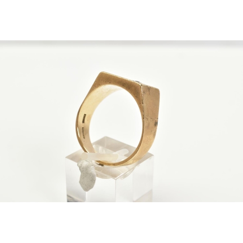 38 - A GENTLEMANS 9CT GOLD SIGNET RING, designed with a square with engraved initial, set with a single r... 