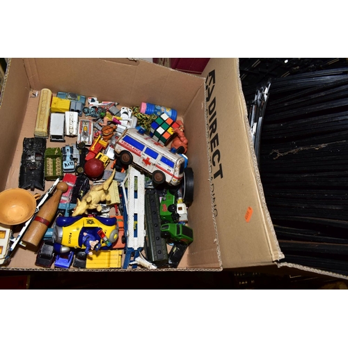 407 - A QUANTITY OF TOYS AND GAMES, including an Action man car, two boxes of Scalextrix track, a painted ... 