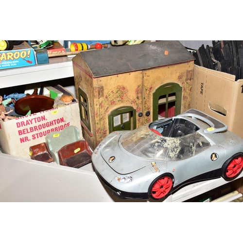 407 - A QUANTITY OF TOYS AND GAMES, including an Action man car, two boxes of Scalextrix track, a painted ... 