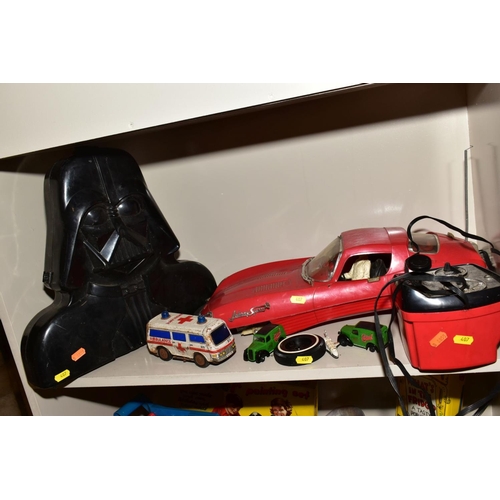 407 - A QUANTITY OF TOYS AND GAMES, including an Action man car, two boxes of Scalextrix track, a painted ... 