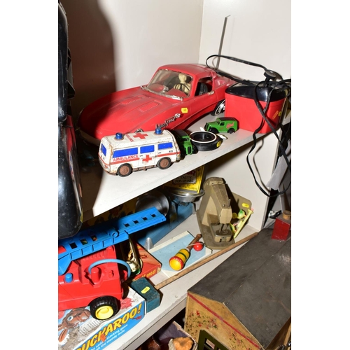 407 - A QUANTITY OF TOYS AND GAMES, including an Action man car, two boxes of Scalextrix track, a painted ... 