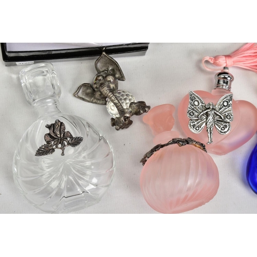 41 - A SELECTION OF ITEMS, to include six various coloured scent bottles, some with white metal floral/bu... 