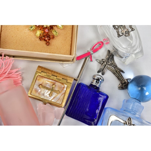 41 - A SELECTION OF ITEMS, to include six various coloured scent bottles, some with white metal floral/bu... 