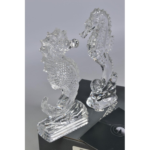 471 - A GROUP OF WATERFORD CRYSTAL SEAHORSES, comprising two boxed 'Seahorse Momento' height 6.5cm, an emp... 