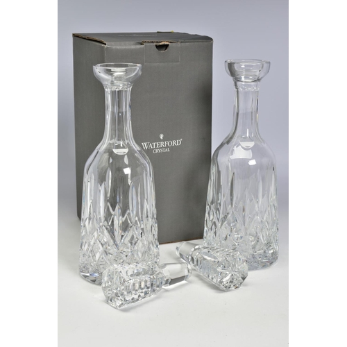 478 - A PAIR OF WATERFORD CRYSTAL LISMORE WINE DECANTERS, one boxed, stamped to side, height with stopper ... 