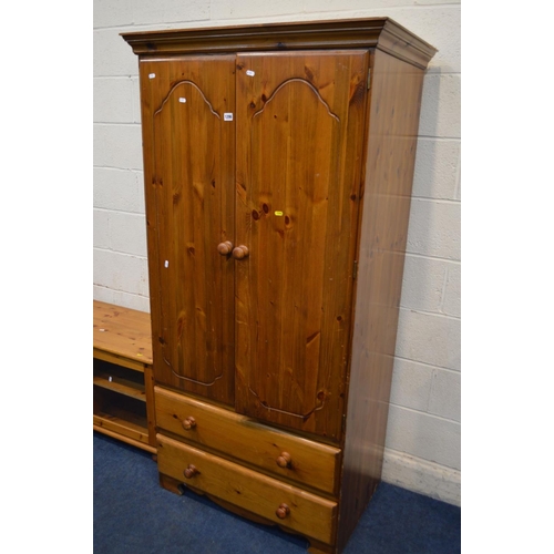 1296 - A MODERN PINE TWO DOOR WARDROBE above two long drawers, width 93cm x depth 58cm x height 183cm toget... 