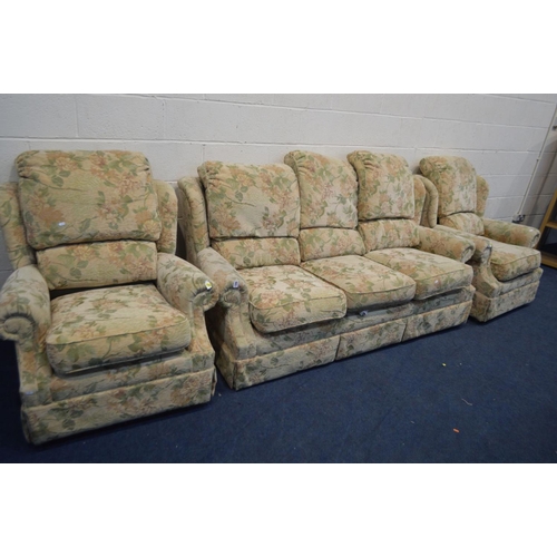 1304 - A G PLAN CREAM FLORAL THREE PIECE LOUNGE SUITE, comprising a three seater settee and a pair of armch... 