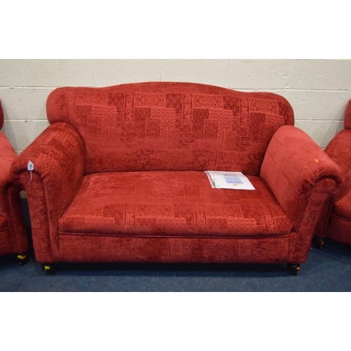 1306 - A GEORGIAN RED UPHOLSTERED THREE PIECE LOUNGE SUITE, re-upholstered in 2016, comprising a two seater... 