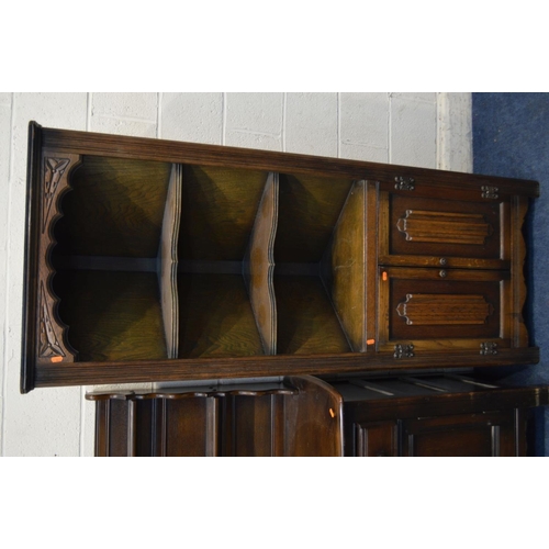 1330 - A DARK ERCOL DRESSER, with two drawers, width 124cm x depth 44cm x height 150cm, together with an oa... 