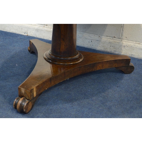 1333 - A VICTORIAN ROSEWOOD CIRCULAR TILT TOP BREAKFAST TABLE, on a cylindrical tapering support, concave t... 