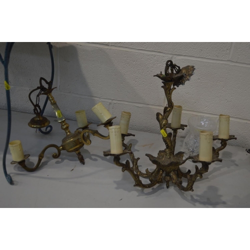 1336 - A METAL AND WICKER TOP OCCASIONAL TABLE, together with two brass ceiling lights (3)