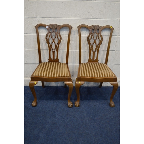 1313 - A PAIR OF LATE 19TH CENTURY WALNUT CHIPPENDALE STYLE DINING CHAIRS with stripped drop in seat pads