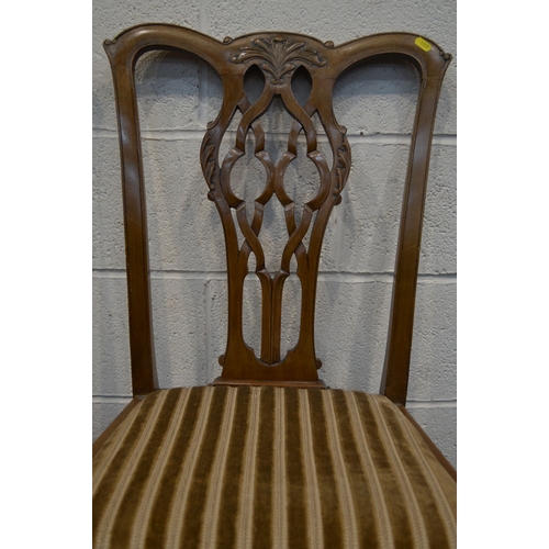1313 - A PAIR OF LATE 19TH CENTURY WALNUT CHIPPENDALE STYLE DINING CHAIRS with stripped drop in seat pads