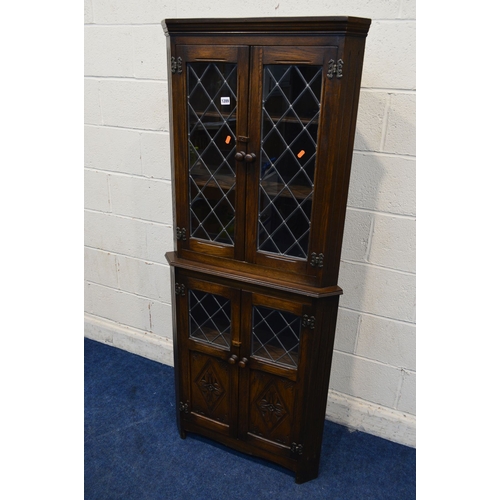 1317 - A MODERN LEAD GLAZED FOUR DOOR CORNER CUPBOARD