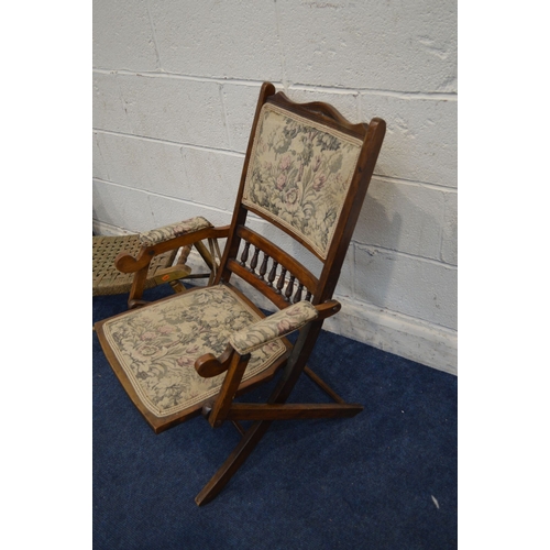 1320 - AN EDWARDIAN BEECH FOLDING CAMPAIGN CHAIR, together with a beech cane seat stool, and two distressed... 