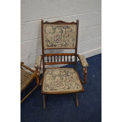 1320 - AN EDWARDIAN BEECH FOLDING CAMPAIGN CHAIR, together with a beech cane seat stool, and two distressed... 
