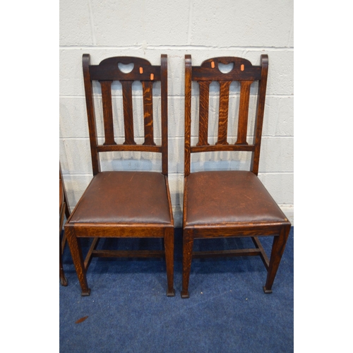 1325 - A PAIR OF EARLY 20TH CENTURY OAK ARTS AND CRAFTS CHAIRS, together with a pair of Edwardian chairs an... 