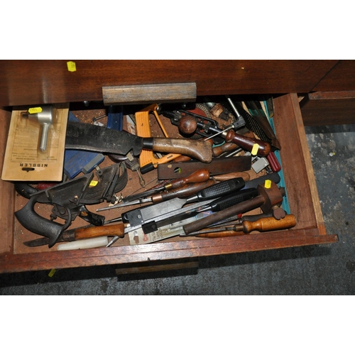 109 - THE CONTENTS OF A DRAWER, containing woodworking tools including a Stanley Rabbet Plane, a spoke Sha... 