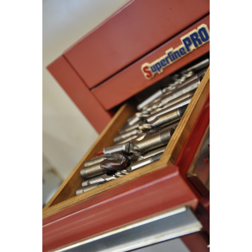 124 - A SUPERLINE PRO MECHANICS TOOL CHEST, with eight drawers full of milling Machine tools and cutters