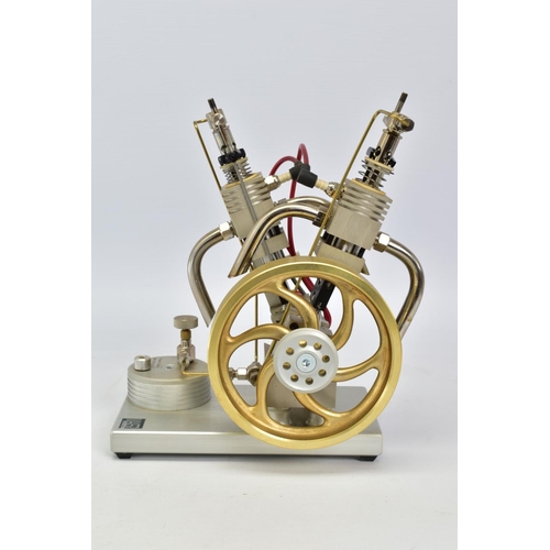 30 - A MAIER MECHANIC V2 GAS ENGINE, not tested, diameter of flywheel approximately 12.5cm, mounted on a ... 