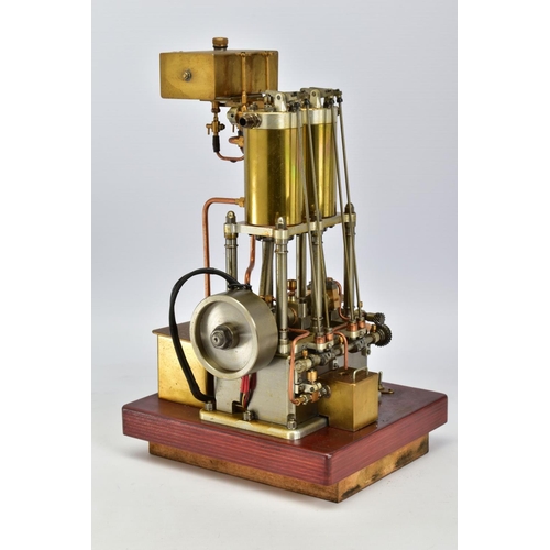 43 - A HANDBUILT MODEL VERTICAL TWIN CYLINDER MARINE ENGINE, not tested, spirit or gas fired, fitted spar... 