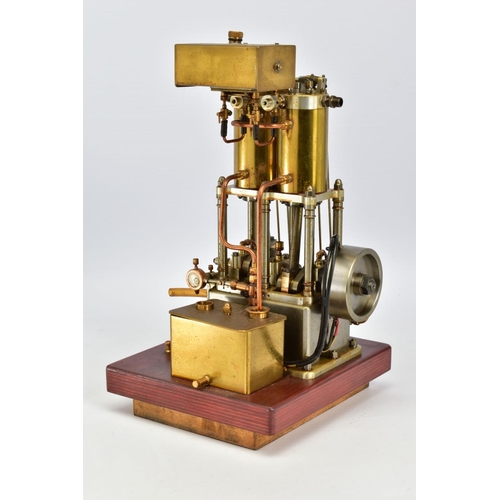 43 - A HANDBUILT MODEL VERTICAL TWIN CYLINDER MARINE ENGINE, not tested, spirit or gas fired, fitted spar... 