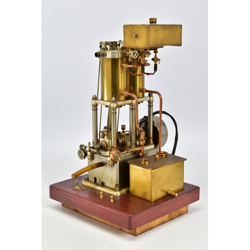 43 - A HANDBUILT MODEL VERTICAL TWIN CYLINDER MARINE ENGINE, not tested, spirit or gas fired, fitted spar... 