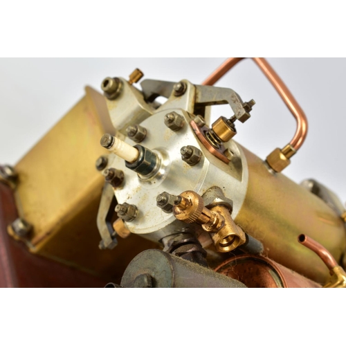 45 - A HANDBUILT MODEL HORIZONTAL TWIN CYLINDER STATIONARY ENGINE, cylinder flanking central flywheel (di... 