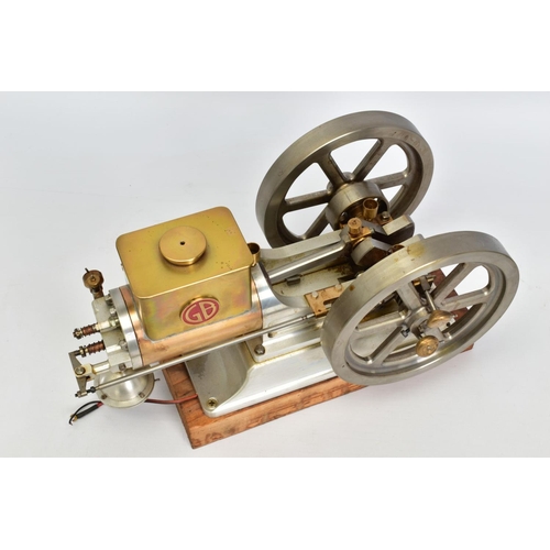 46 - A HANDBUILT MODEL HORIZONTAL SINGLE CYLINDER STATIONARY ENGINE, powering twin flywheels (diameter ap... 