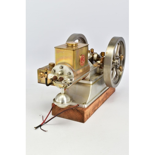 46 - A HANDBUILT MODEL HORIZONTAL SINGLE CYLINDER STATIONARY ENGINE, powering twin flywheels (diameter ap... 