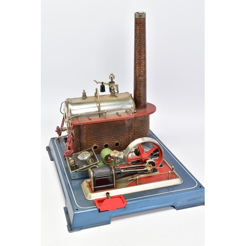 5 - AN UNBOXED WILESCO D24el LIVE STEAM ENGINE, not tested, horizontal boiler mounted on tinplate brick ... 