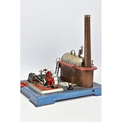 5 - AN UNBOXED WILESCO D24el LIVE STEAM ENGINE, not tested, horizontal boiler mounted on tinplate brick ... 