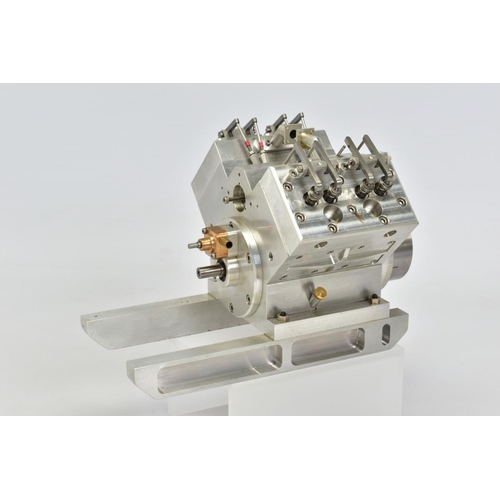 52 - A HANDBUILT MODEL V4 CYLINDER AIRCRAFT ENGINE, not tested, constructed and finished to a very high s... 