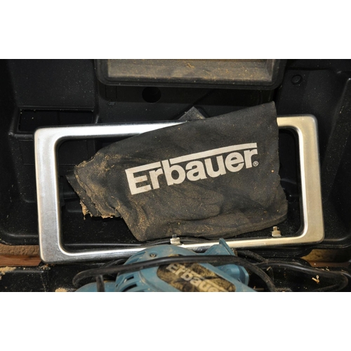 69 - A CASED ERBAUER 3'' ELECTRIC BELT SANDER, with spare belts