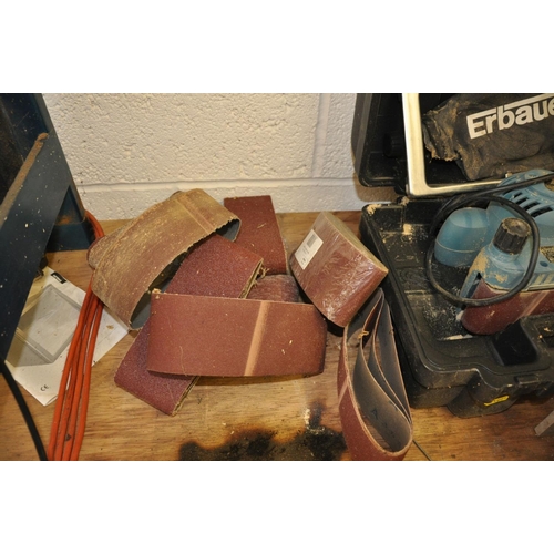 69 - A CASED ERBAUER 3'' ELECTRIC BELT SANDER, with spare belts