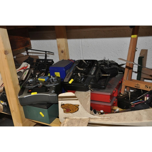 74 - A QUANTITY OF MODEL AIR PLANE AND HELICOPTER PARTS, controllers, motors, batteries, chargers and pro... 